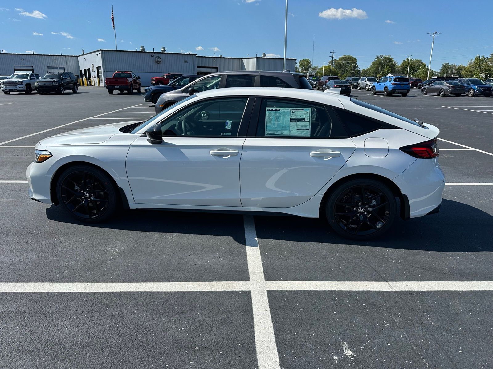 2026 Honda Civic Hatchback Sport photo 2