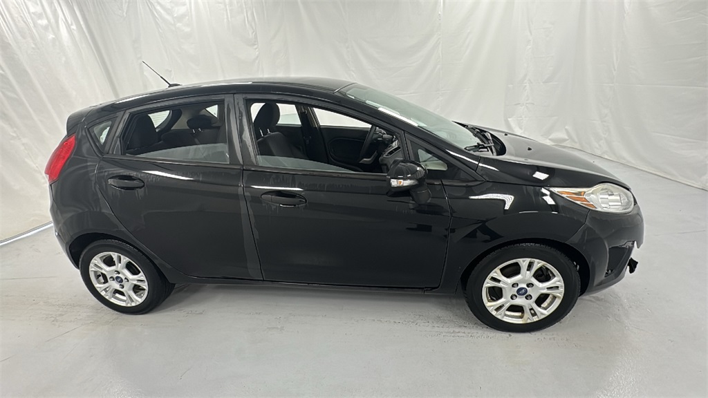 Used 2013 Ford Fiesta SE with VIN 3FADP4EJ6DM164819 for sale in Janesville, WI