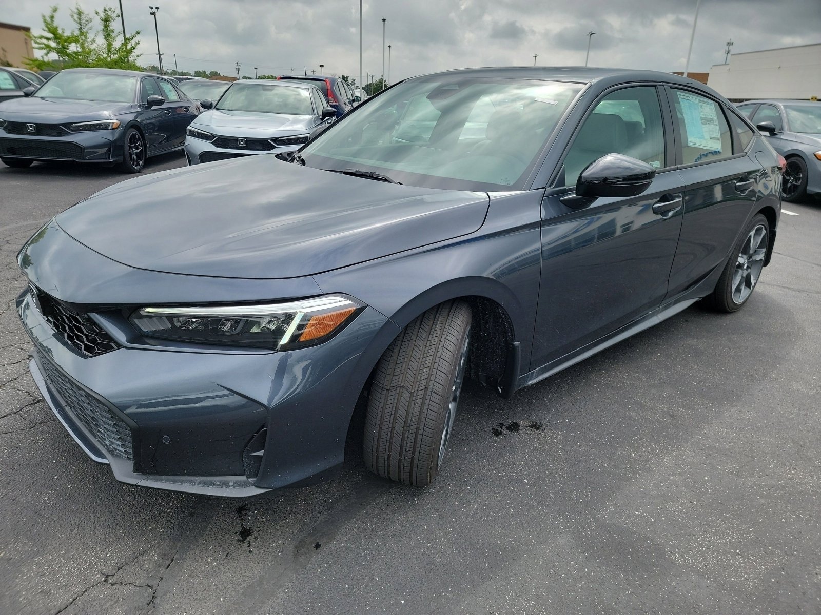 2026 Honda Civic Sport Touring Hatchback Hybrid photo 3