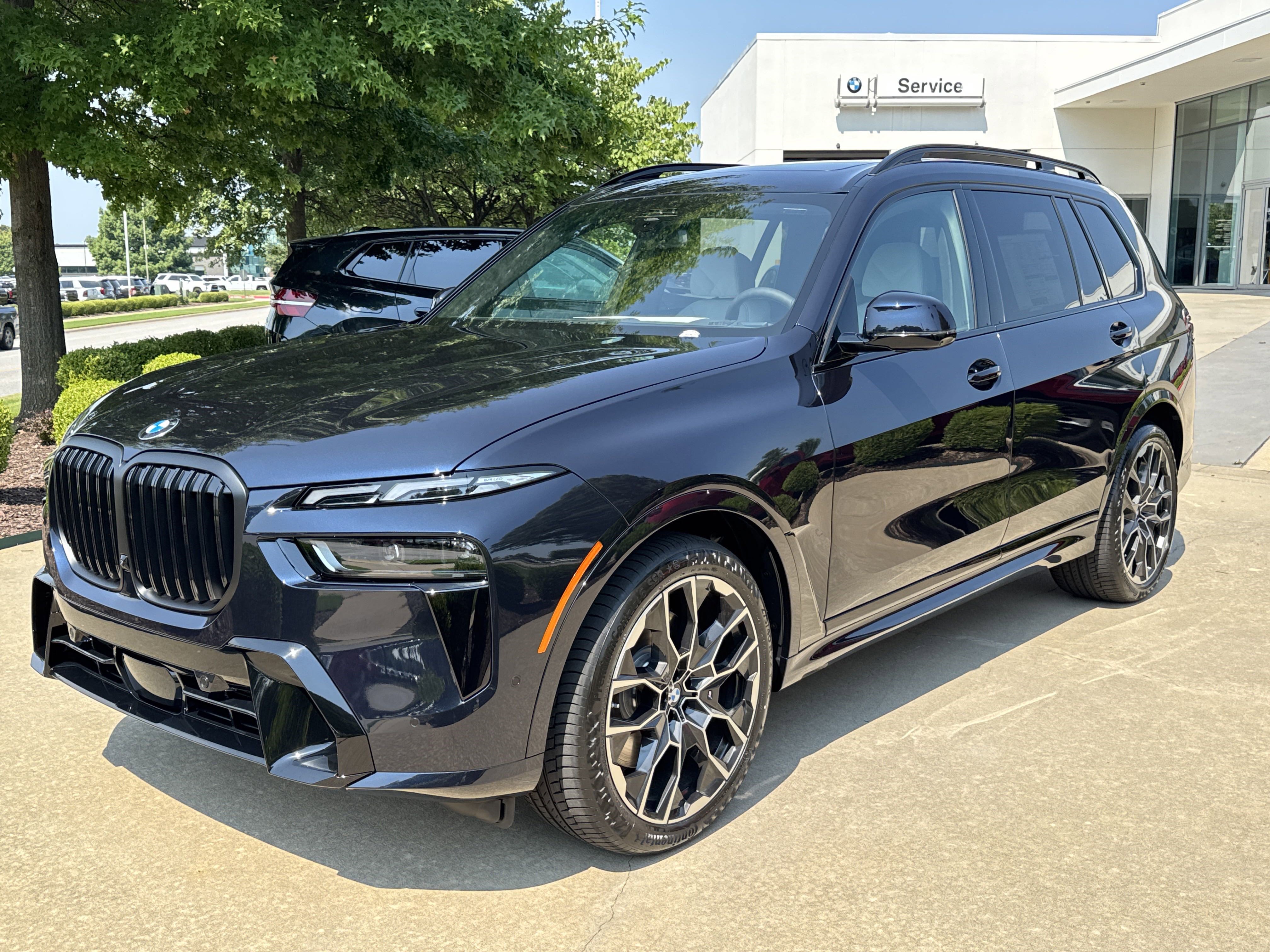New 2026 CARBON BLACK BMW xDrive40i image 1