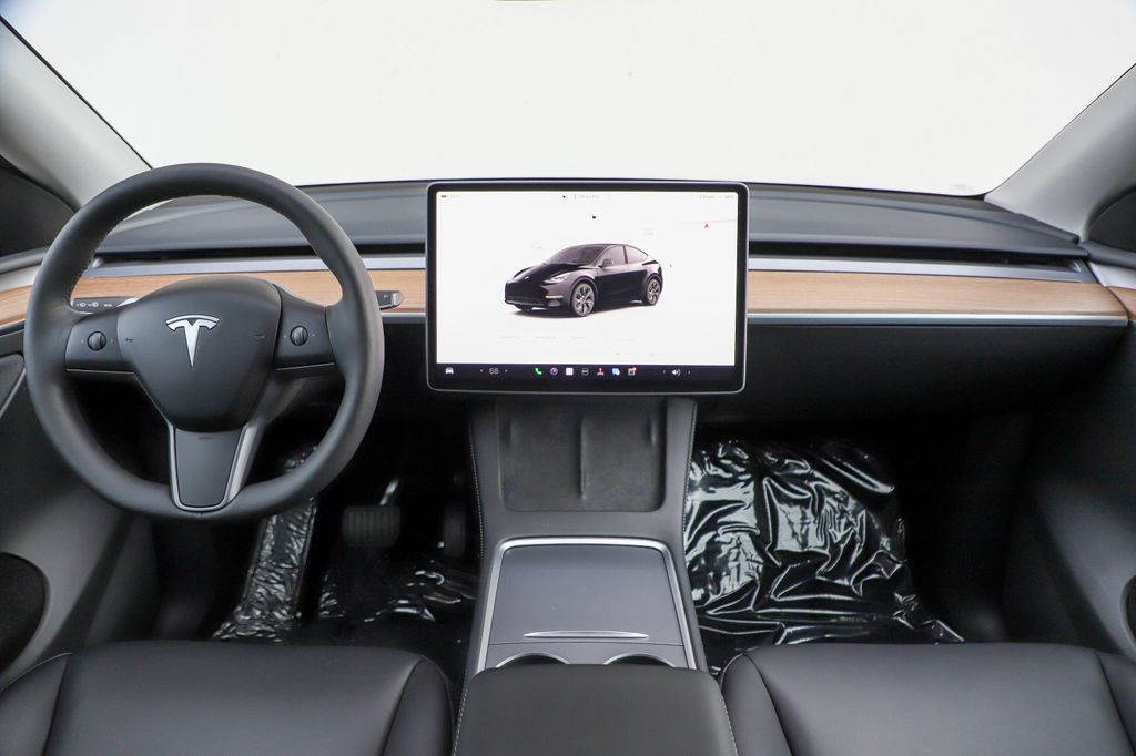 Used 2024 Tesla Model Y Long Range with VIN 7SAYGAEEXRF107955 for sale in Kansas City