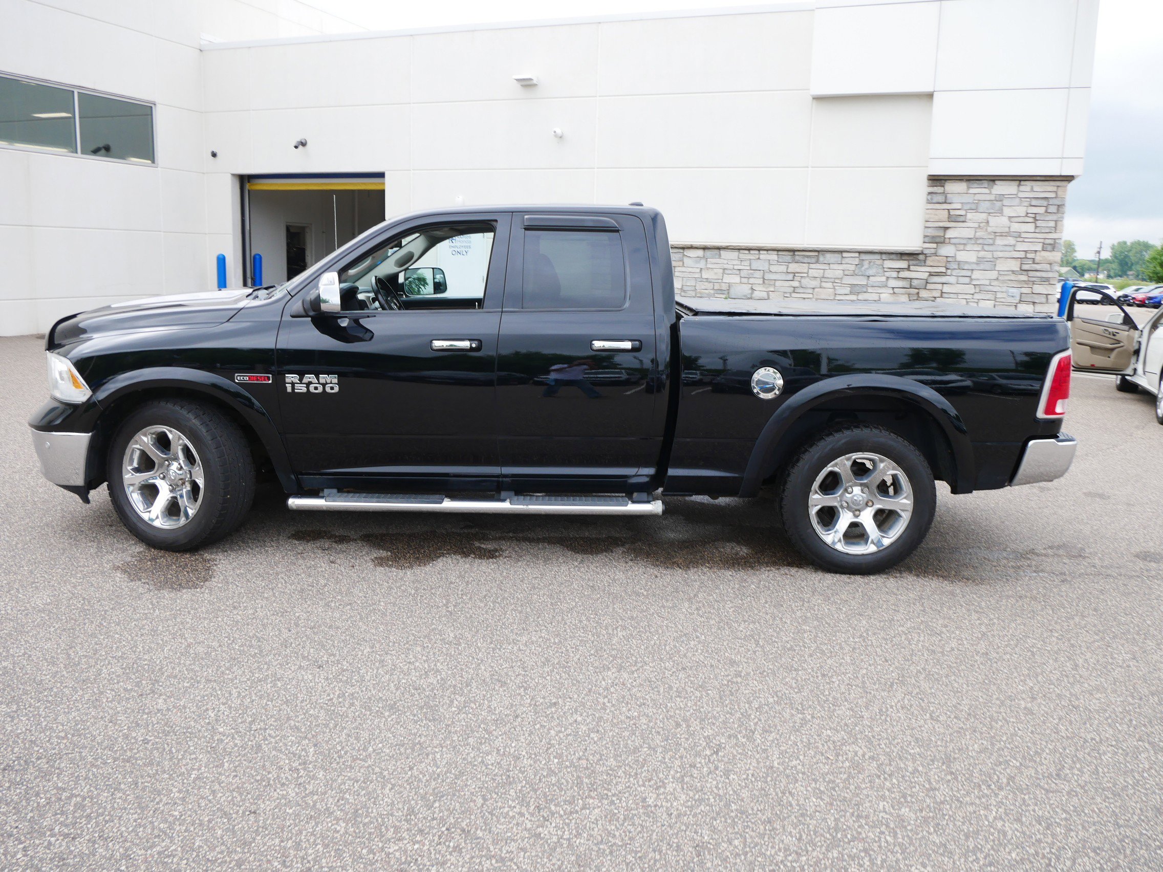 Used 2015 RAM Ram 1500 Laramie with VIN 1C6RR7JM6FS506508 for sale in Coon Rapids, Minnesota