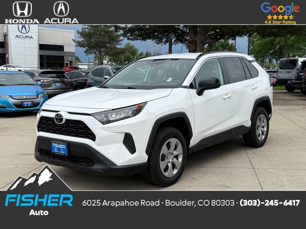 Used 2021 Super White Toyota LE image 1