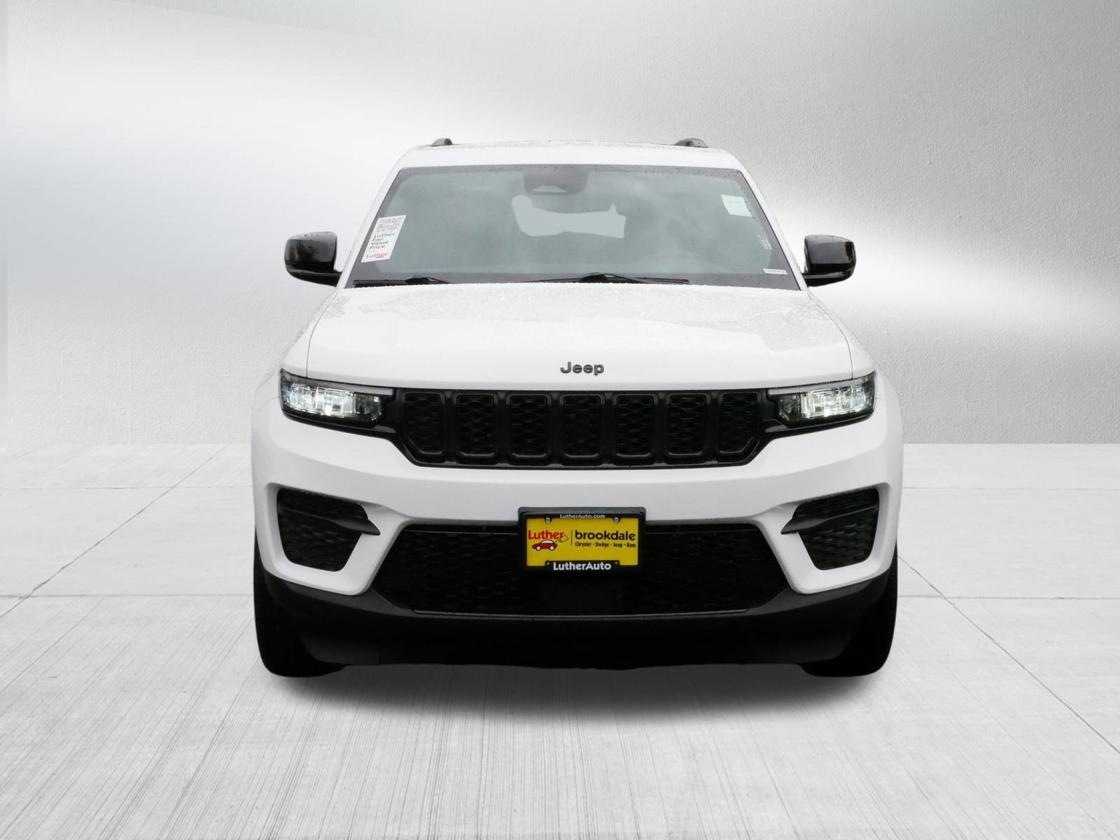 Certified 2023 Jeep Grand Cherokee Altitude with VIN 1C4RJHAG9PC595163 for sale in Brooklyn Park, Minnesota