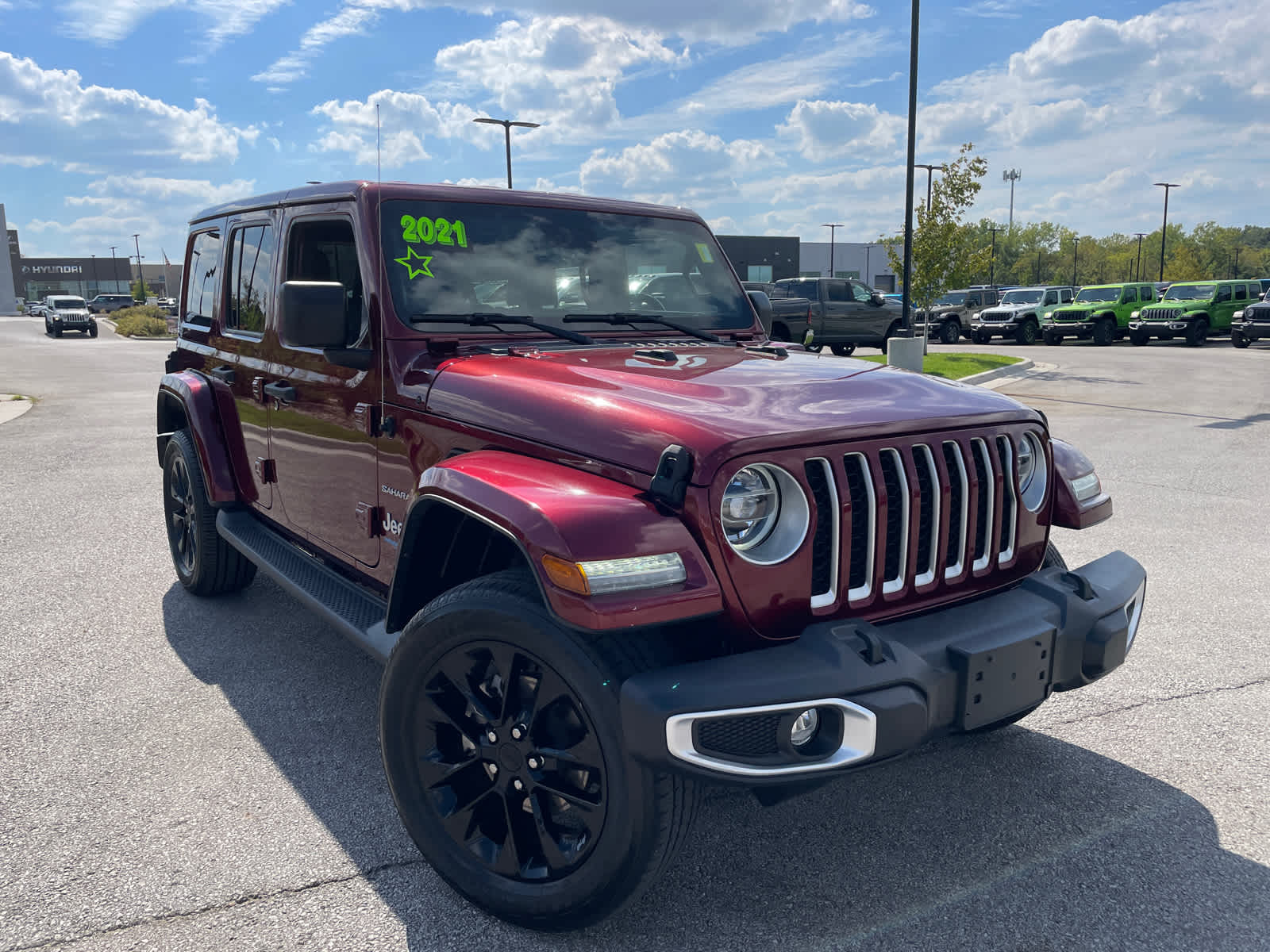 Used 2021 Jeep Wrangler Unlimited Sahara 4XE with VIN 1C4JJXP61MW766116 for sale in Kansas City