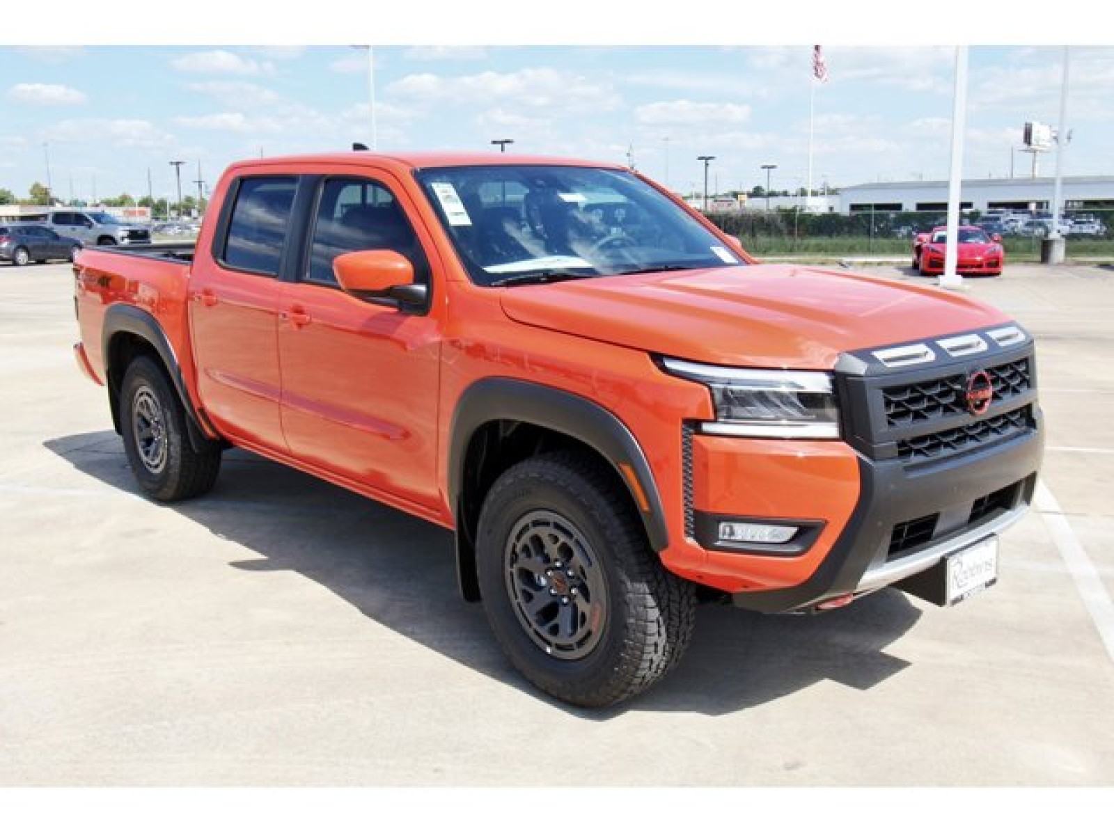 2025 Nissan Frontier Crew Cab PRO-4X® Orange at Robbins Nissan