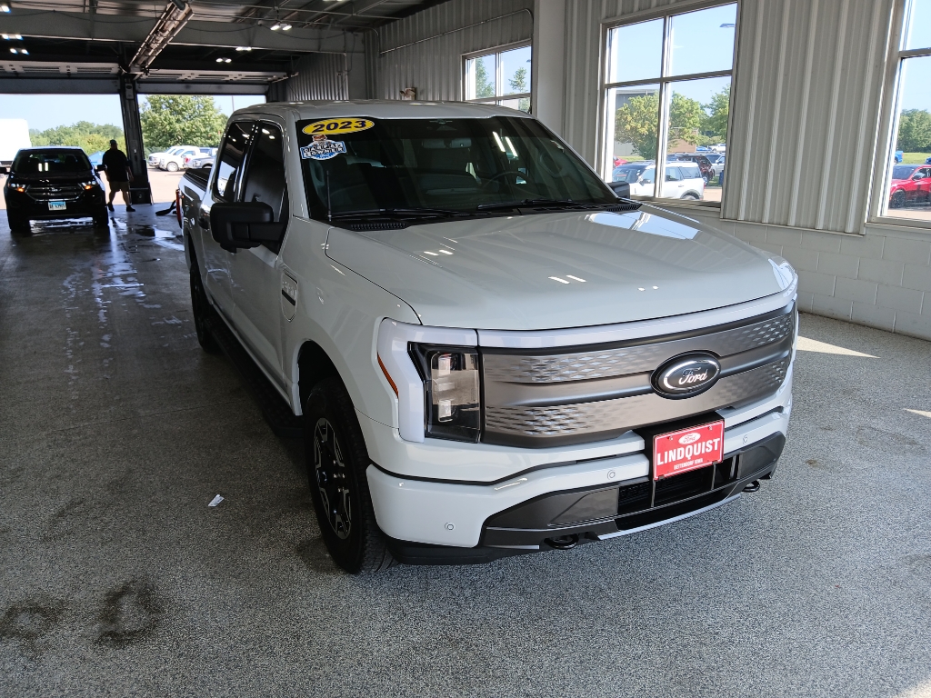 Certified 2023 Ford F-150 Lightning XLT with VIN 1FTVW1EL0PWG36387 for sale in Bettendorf, IA