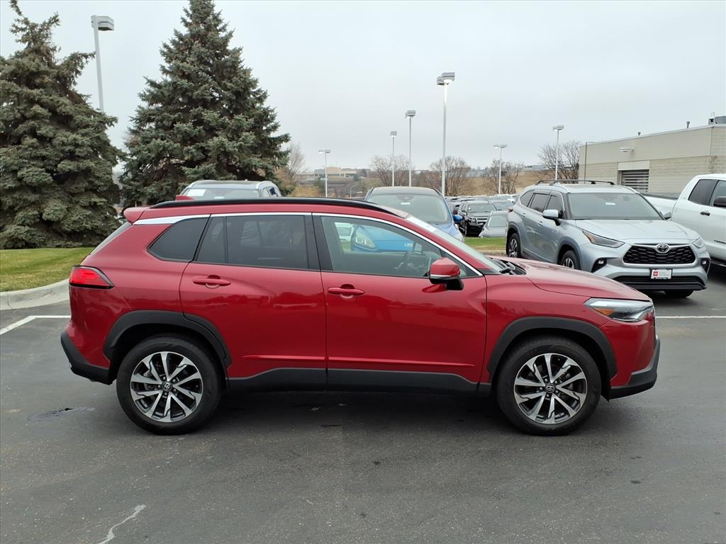 Certified 2023 Toyota Corolla Cross XLE with VIN 7MUDAABG9PV063903 for sale in Burnsville, Minnesota