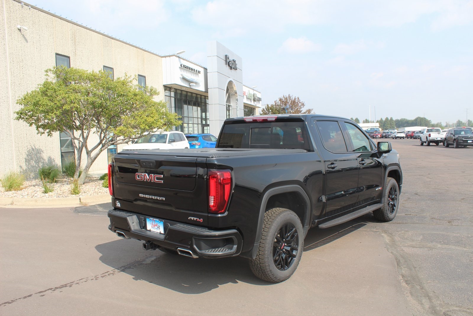 Used 2021 GMC Sierra 1500 AT4 with VIN 1GTP9EED9MZ326345 for sale in Luverne, Minnesota