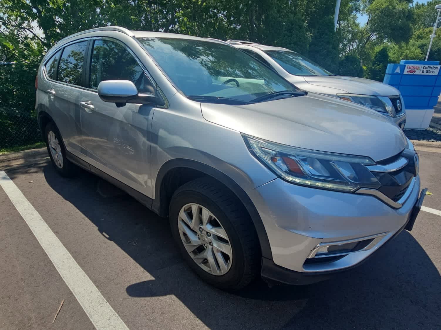 Certified 2016 Honda CR-V EX-L with VIN 5J6RM4H79GL045817 for sale in Hopkins, Minnesota