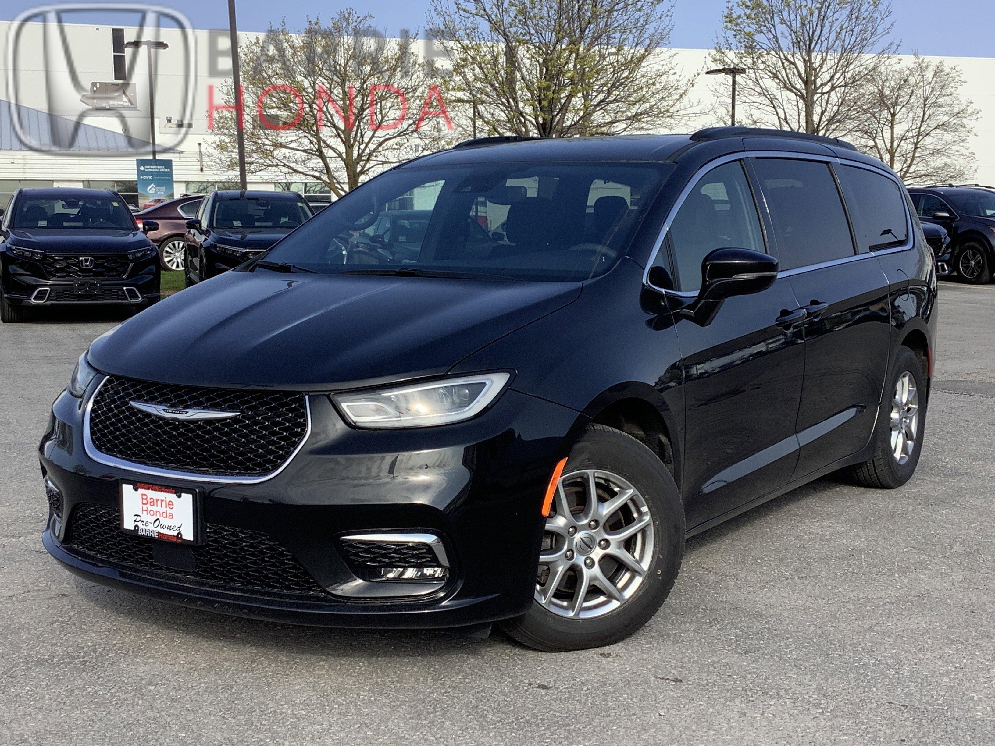 Used 2022 Brilliant Black Crystal Pearl Chrysler Touring image 1