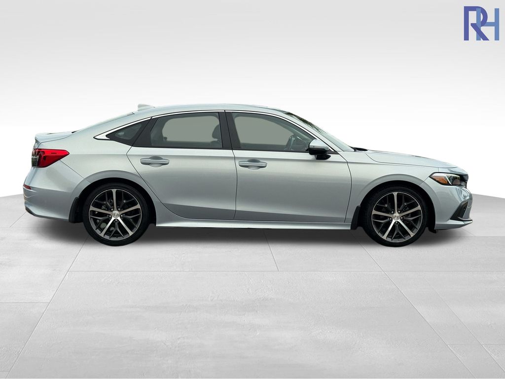 Used 2023 Honda Civic Touring with VIN 2HGFE1F94PH307475 for sale in Coon Rapids, Minnesota