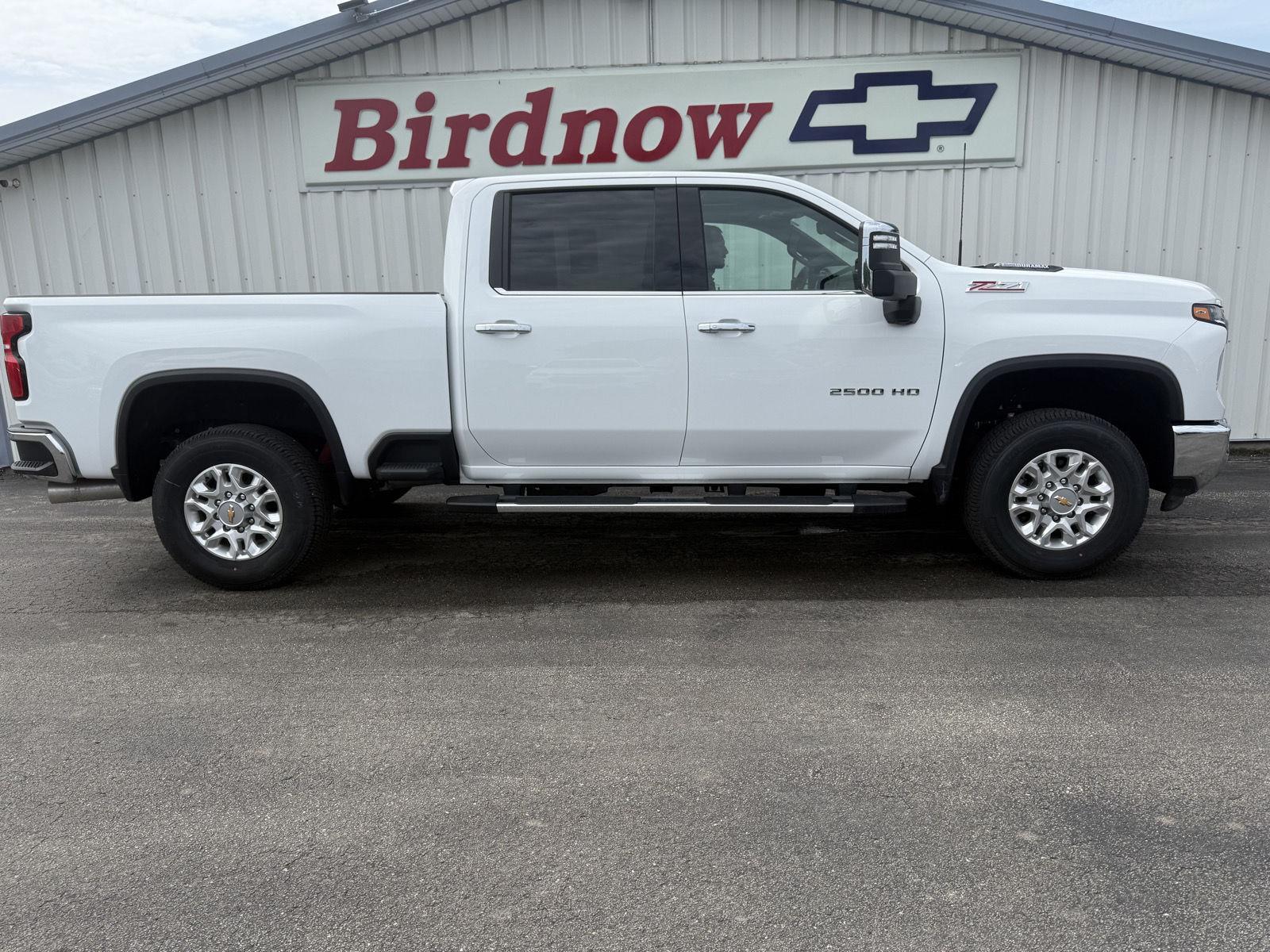 Used 2024 Summit White Chevrolet LTZ image 1