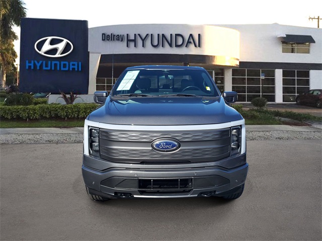 Used 2023 Ford F-150 Lightning Lariat with VIN 1FTVW1EL5PWG27006 for sale in Delray Beach, FL
