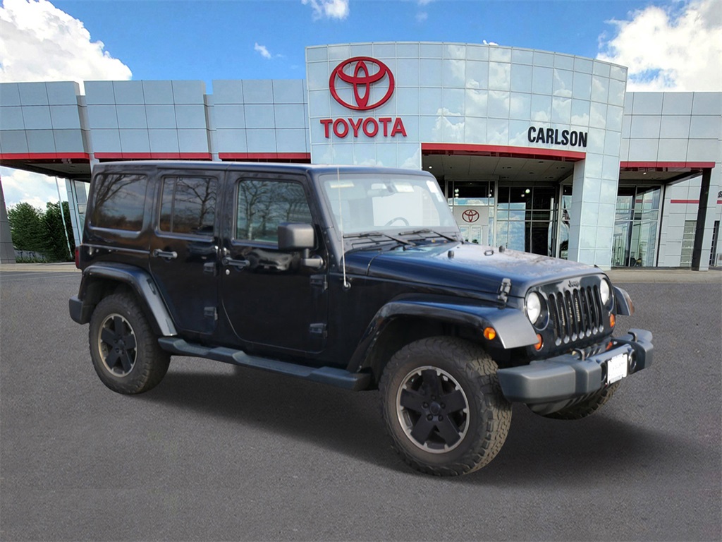 Used 2012 Jeep Wrangler Unlimited Altitude with VIN 1C4HJWEG8CL269262 for sale in Minneapolis, Minnesota