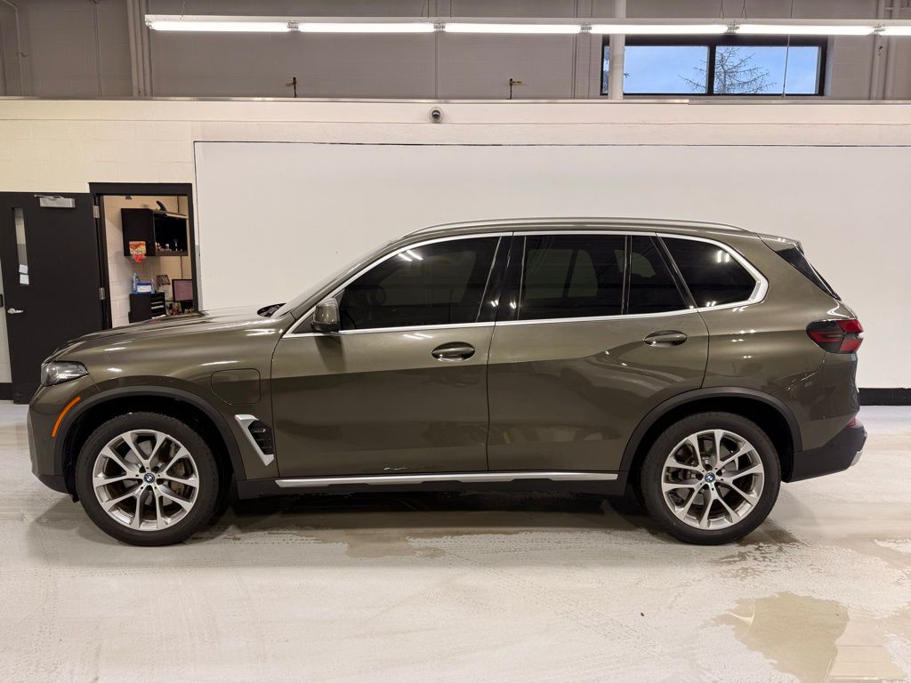Used 2024 BMW X5 50e with VIN 5UX43EU03R9U94345 for sale in Golden Valley, Minnesota