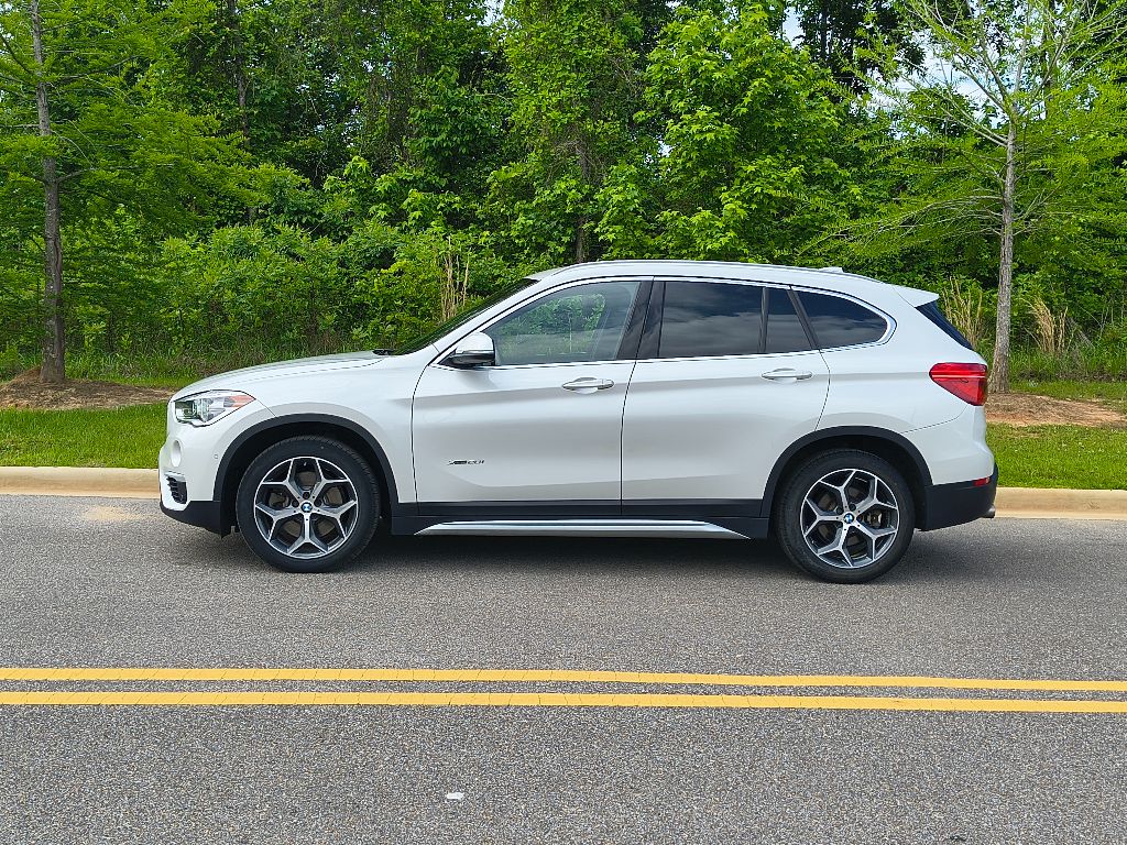Used 2017 BMW X1 28i with VIN WBXHT3C34H5F82061 for sale in Greenville, AL