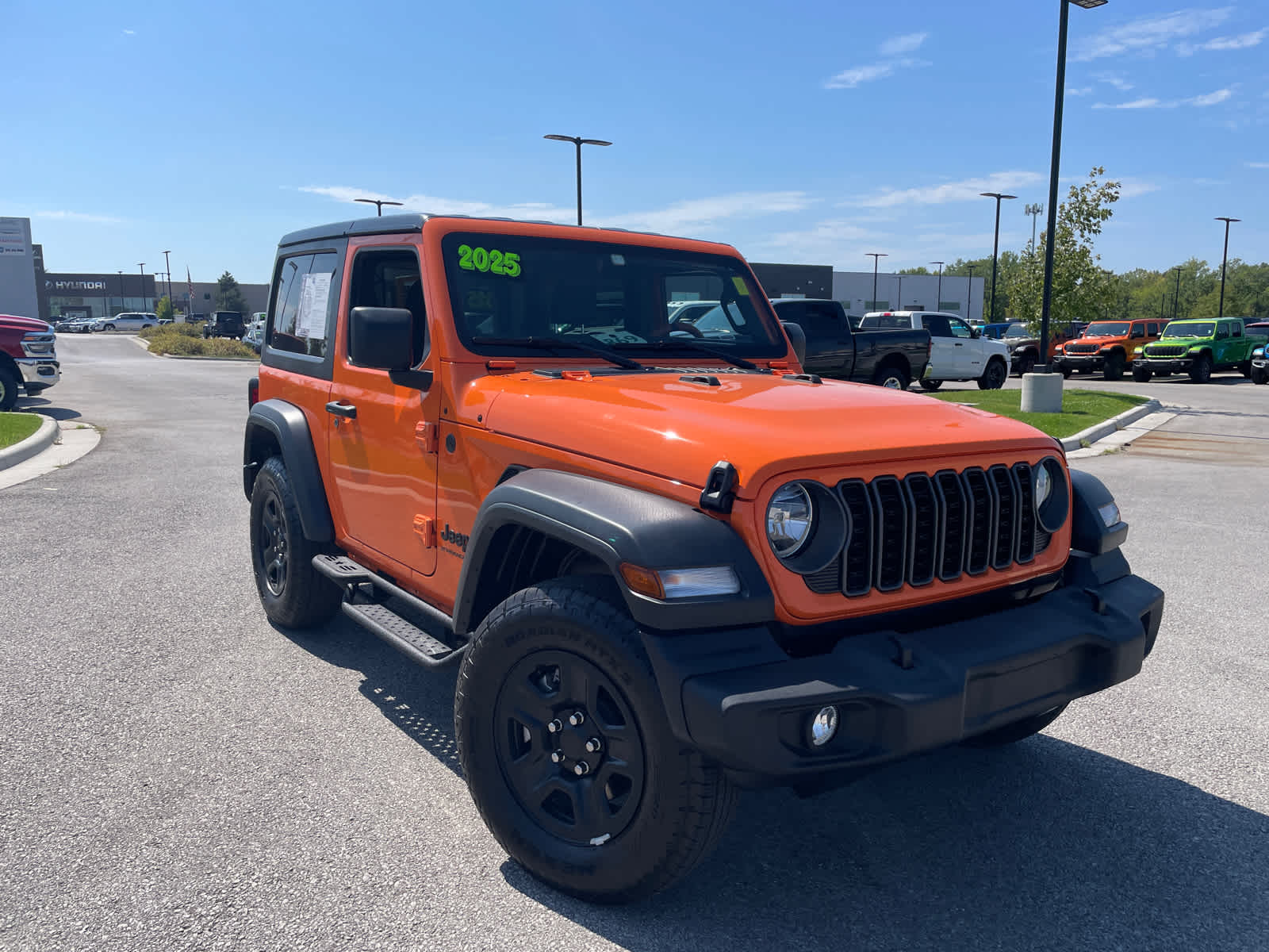 Used 2025 Jeep Wrangler 2-Door Sport with VIN 1C4PJXAN8SW617130 for sale in Kansas City