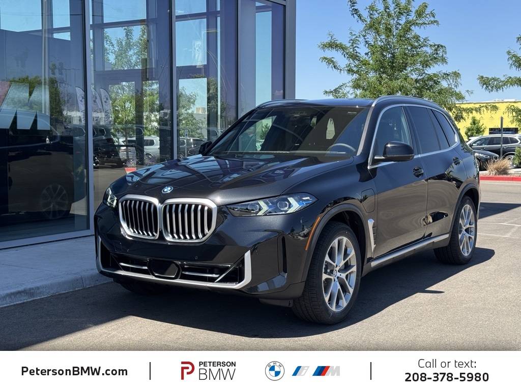 New 2026 Black Sapphire Metallic BMW xDrive50e image 1