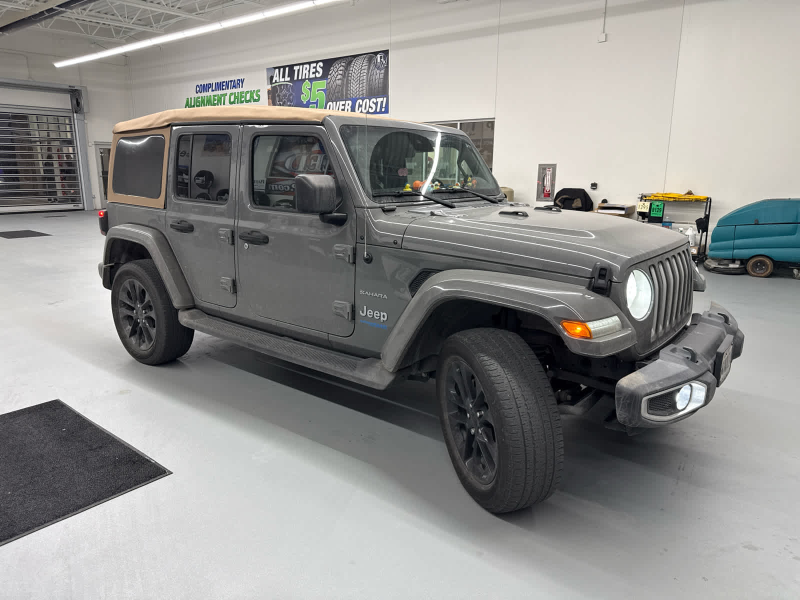 Used 2021 Jeep Wrangler Unlimited Sahara 4XE with VIN 1C4JJXP68MW787643 for sale in Kansas City