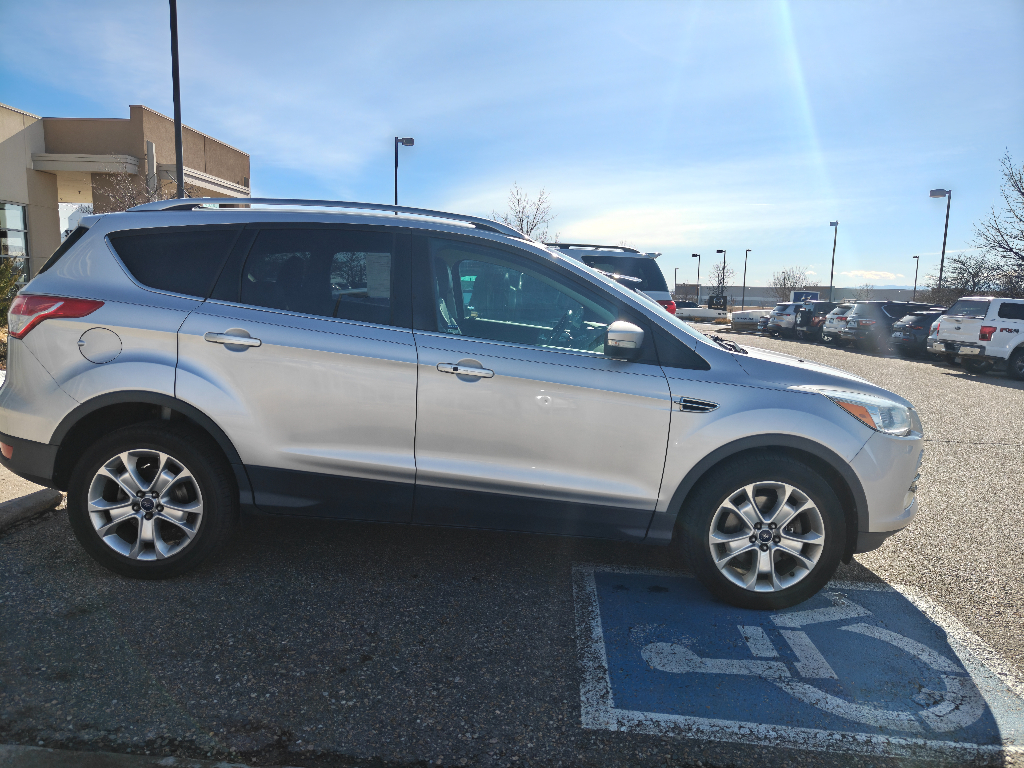 Used 2014 Ford Escape Titanium with VIN 1FMCU9J99EUC51937 for sale in Loveland, CO