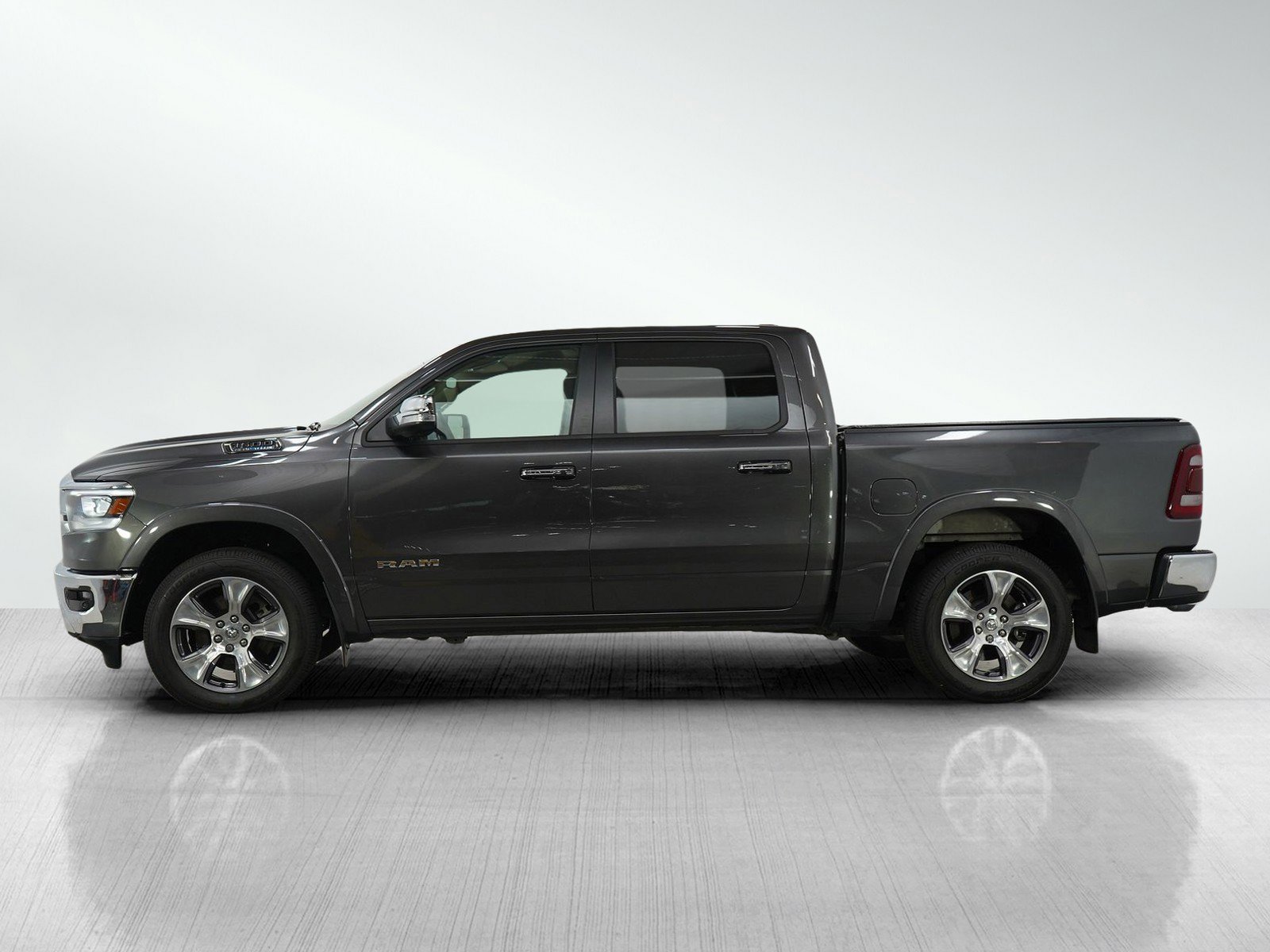 Used 2021 RAM Ram 1500 Pickup Laramie with VIN 1C6SRFJT3MN785902 for sale in Burnsville, Minnesota