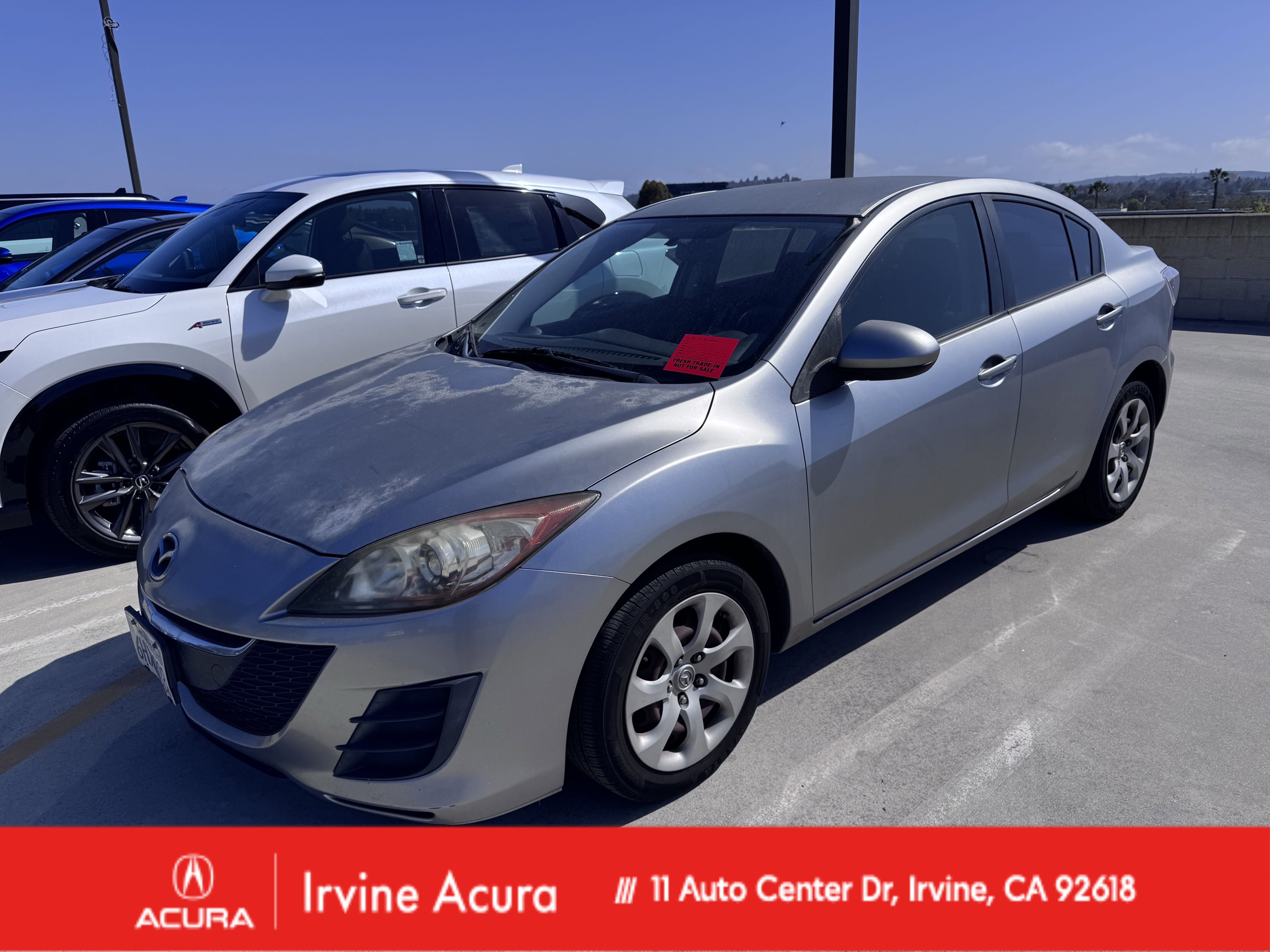 Used 2010 Liquid Silver Metallic Mazda i Sport image 1