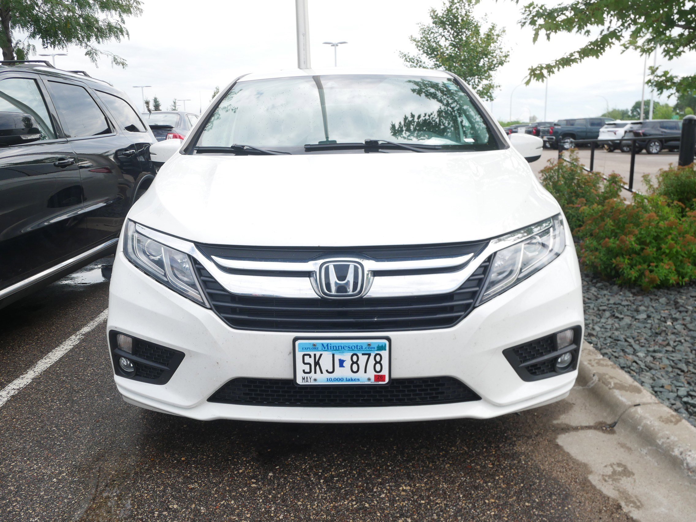 Used 2018 Honda Odyssey EX-L with VIN 5FNRL6H70JB082978 for sale in Brooklyn Center, Minnesota