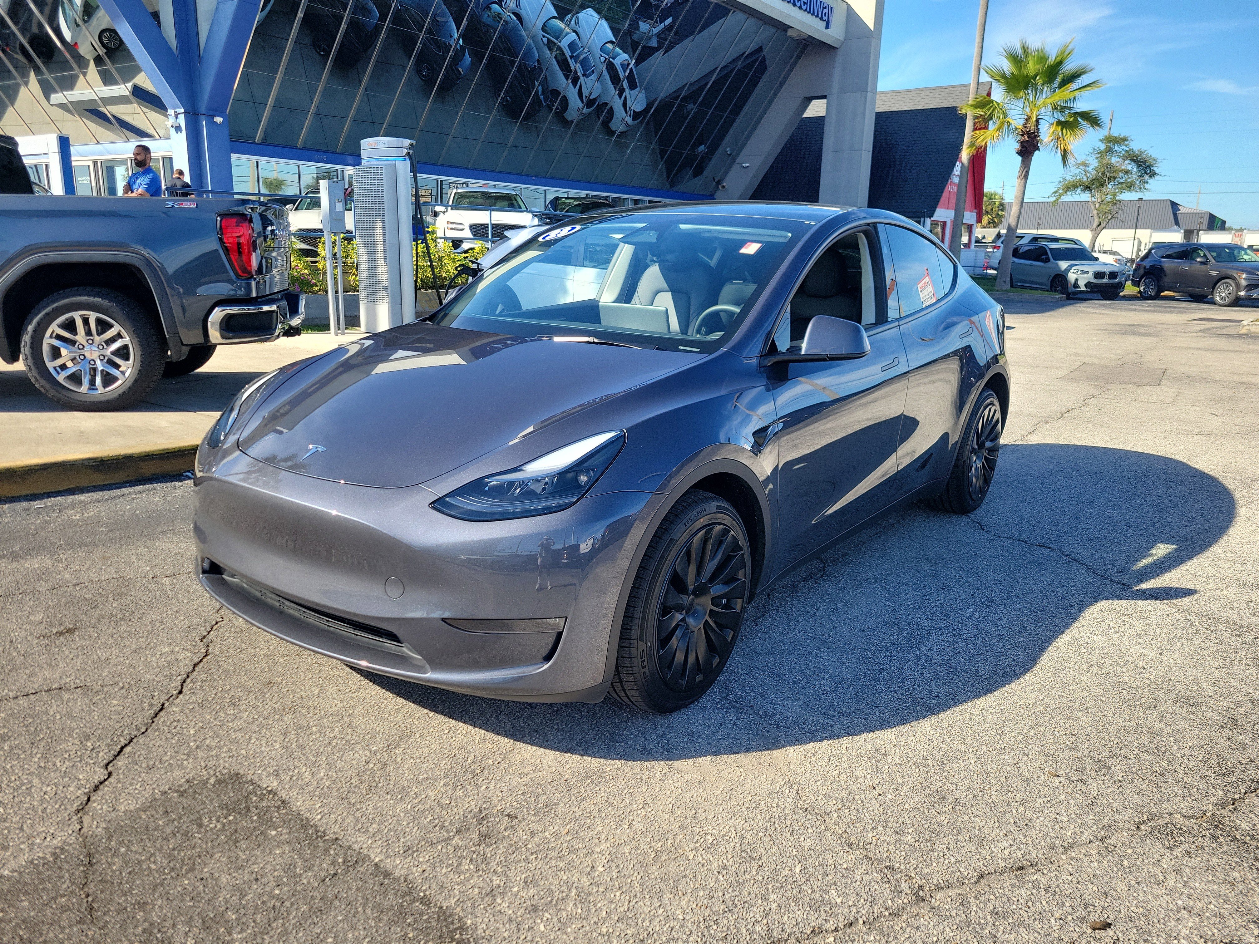 Used 2023 Tesla Model Y Long Range with VIN 7SAYGDEE1PA198433 for sale in Orlando, FL