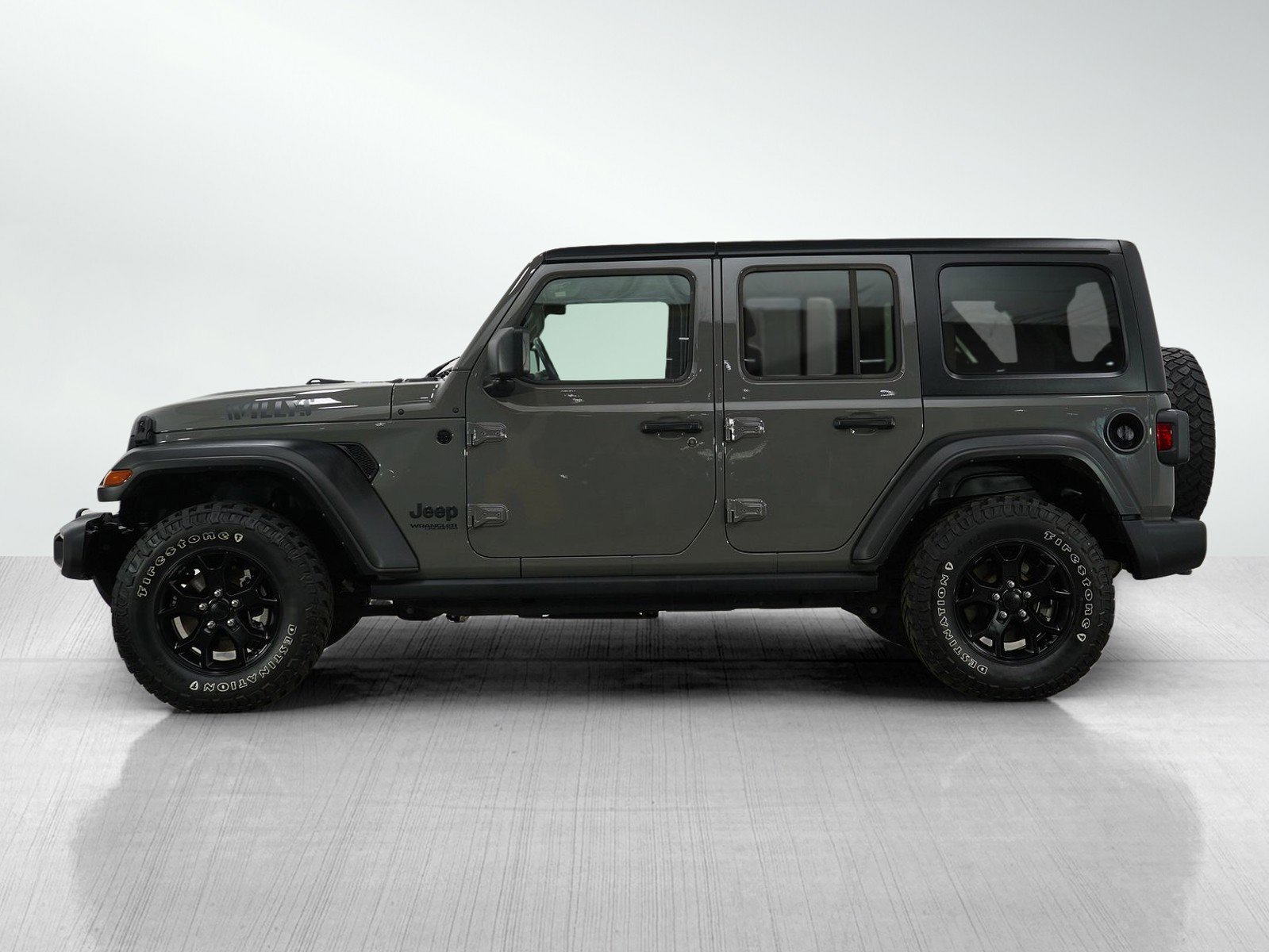 Used 2021 Jeep Wrangler Unlimited Willys with VIN 1C4HJXDGXMW712812 for sale in Wayzata, Minnesota