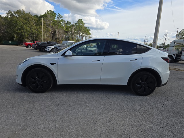 Used 2025 Tesla Model Y Long Range with VIN 7SAYGDEE6SA361053 for sale in Brooksville, FL