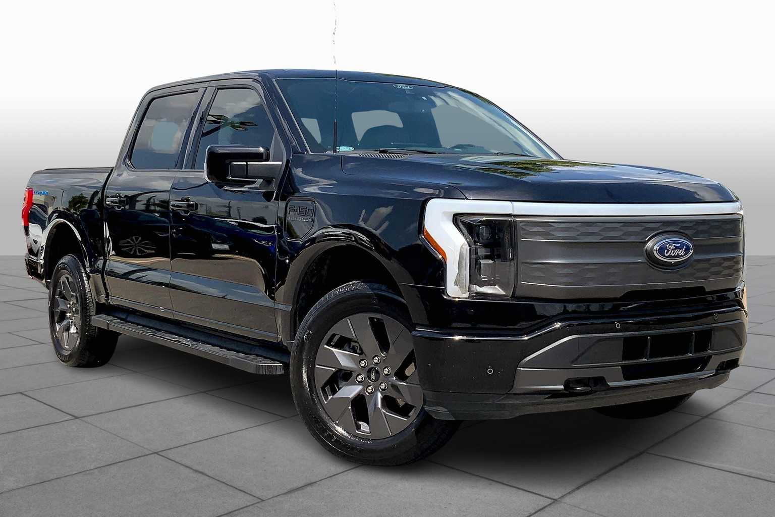 Used 2022 Ford F-150 Lightning Lariat with VIN 1FTVW1EL9NWG00954 for sale in Sugar Land, TX
