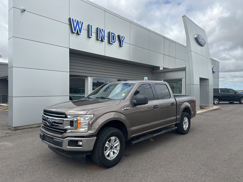 Used 2018 Stone Gray Ford XLT image 1