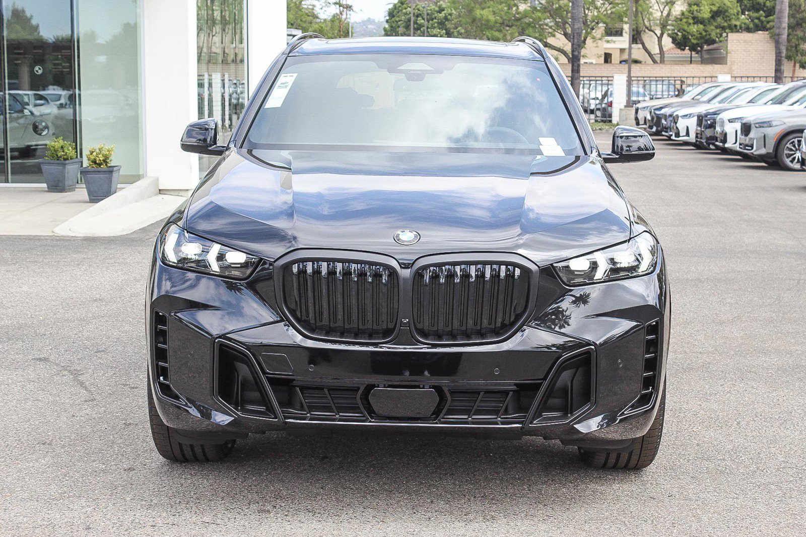New 2026 Black Sapphire Metallic BMW sDrive40i image 2