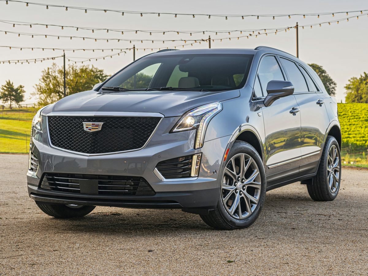 Used 2022 Stellar Black Metallic Cadillac Sport image 1