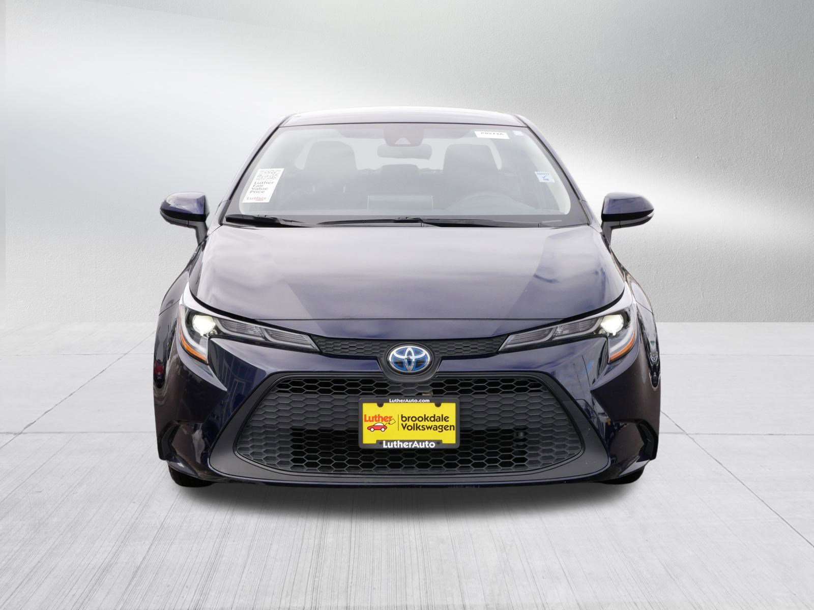 Used 2020 Toyota Corolla Hybrid Base with VIN JTDBBRBE1LJ027741 for sale in Brooklyn Center, Minnesota