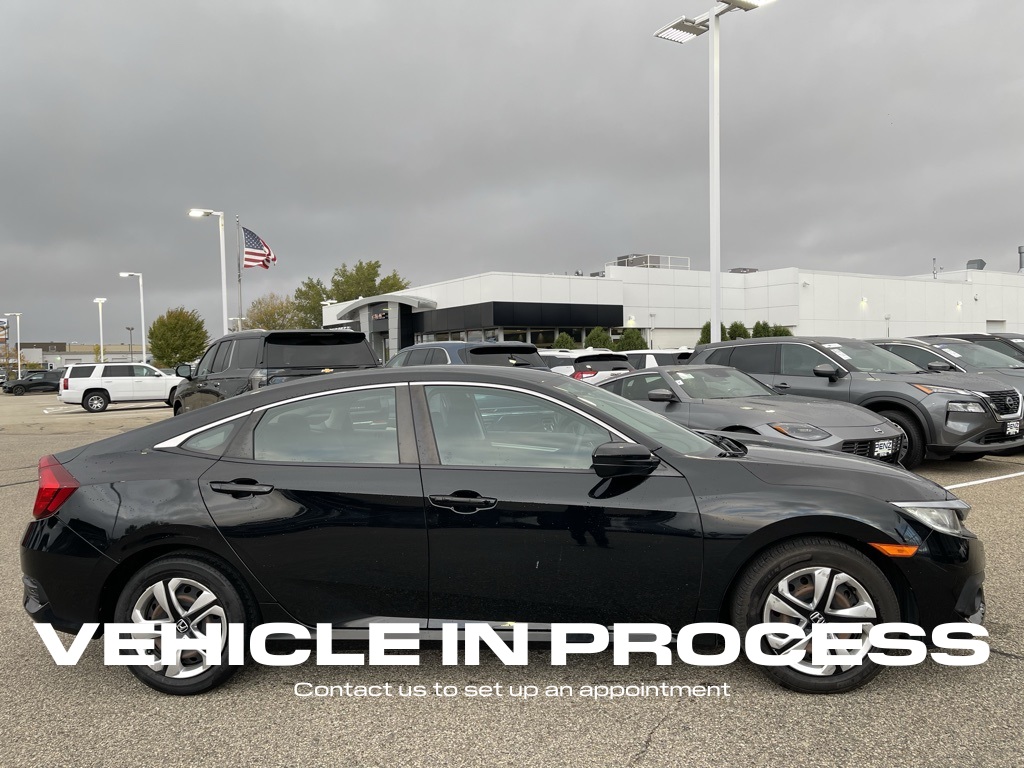 Used 2017 Honda Civic LX with VIN 19XFC2F65HE037265 for sale in Rochester, Minnesota