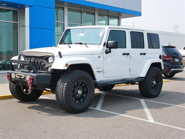 Used 2015 Jeep Wrangler Unlimited Sahara with VIN 1C4BJWEG5FL680581 for sale in Roseville, Minnesota
