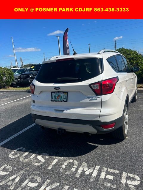 Used 2019 Ford Escape Titanium with VIN 1FMCU0J93KUA30289 for sale in Davenport, FL