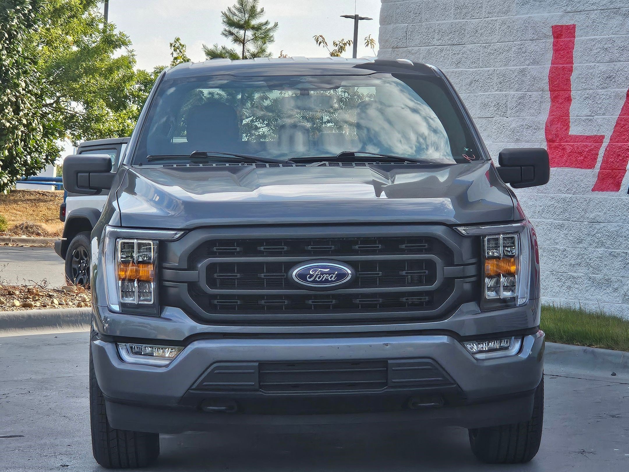 Used 2023 Ford F-150 XLT with VIN 1FTFW1E53PFA63152 for sale in Little Rock