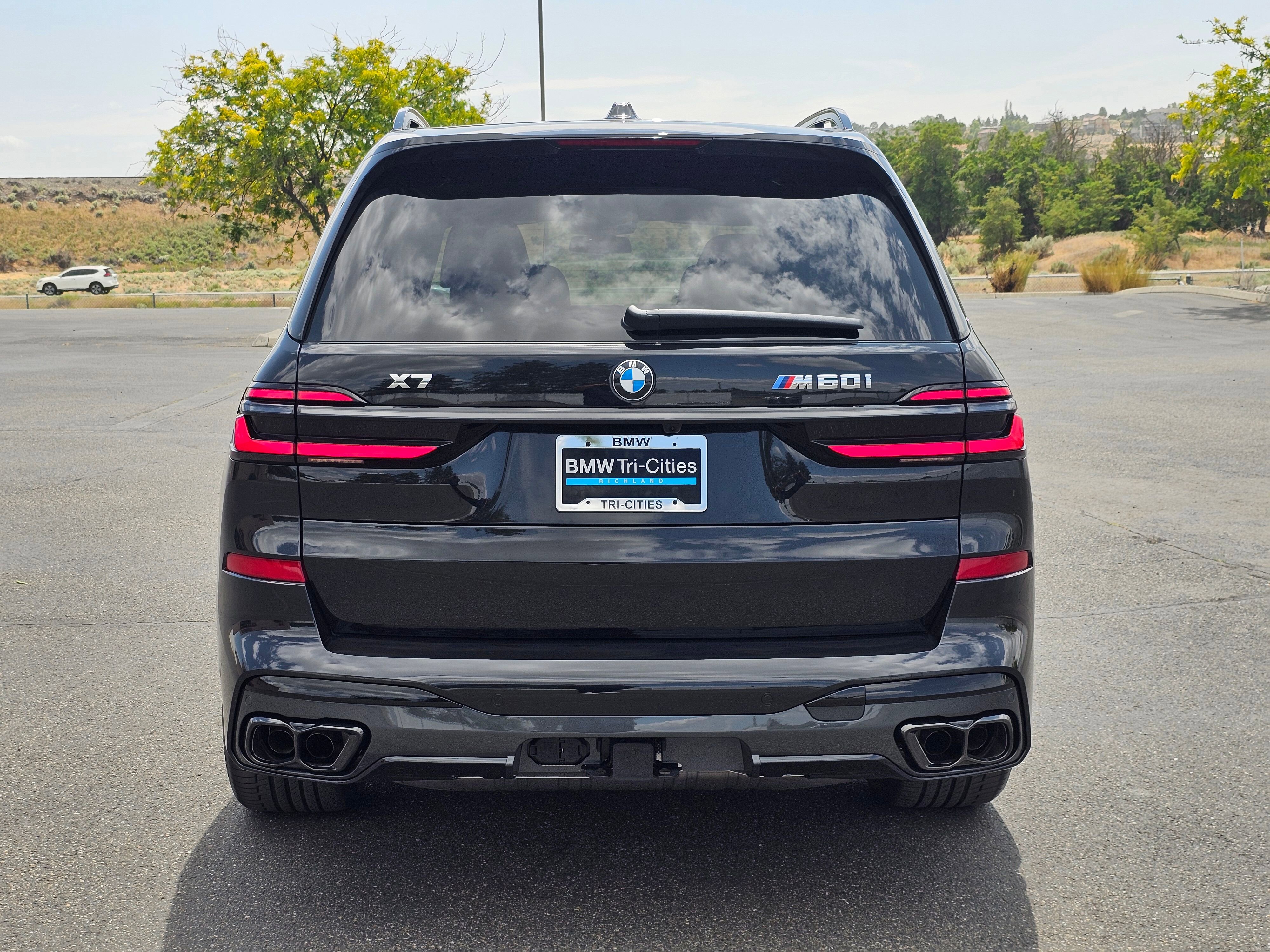 New 2026 Black Sapphire Metallic BMW M60i image 5