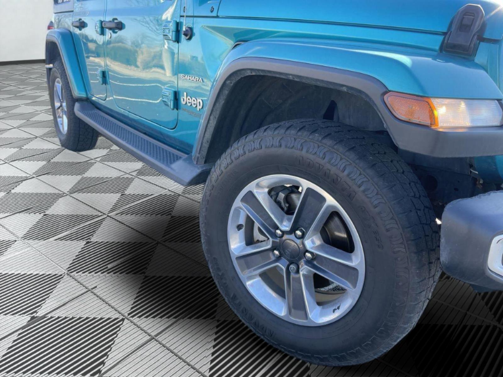 Used 2019 Jeep Wrangler Unlimited Sahara with VIN 1C4HJXEN0KW688370 for sale in Kansas City