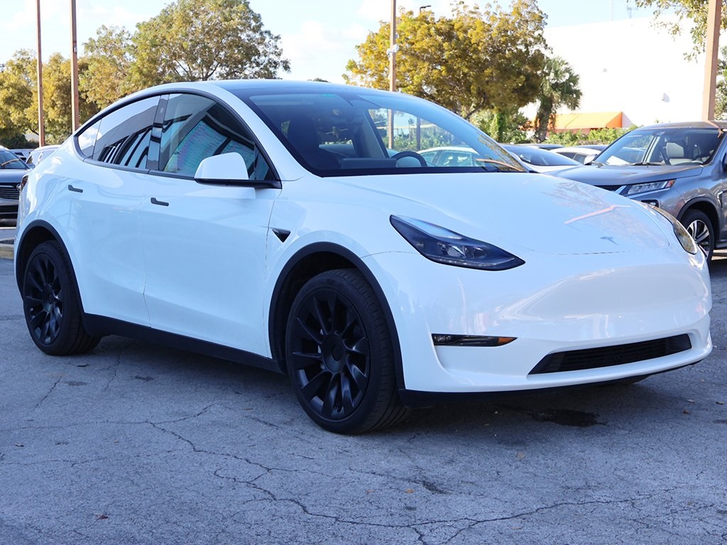 Used 2023 Tesla Model Y Long Range with VIN 7SAYGDEE8PF675801 for sale in Miami, FL