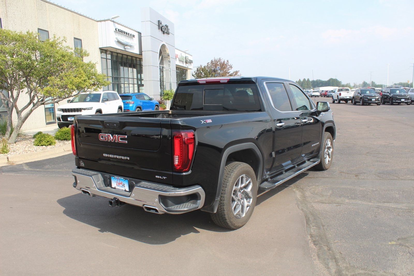 Used 2024 GMC Sierra 1500 SLT with VIN 3GTUUDED1RG387059 for sale in Luverne, Minnesota