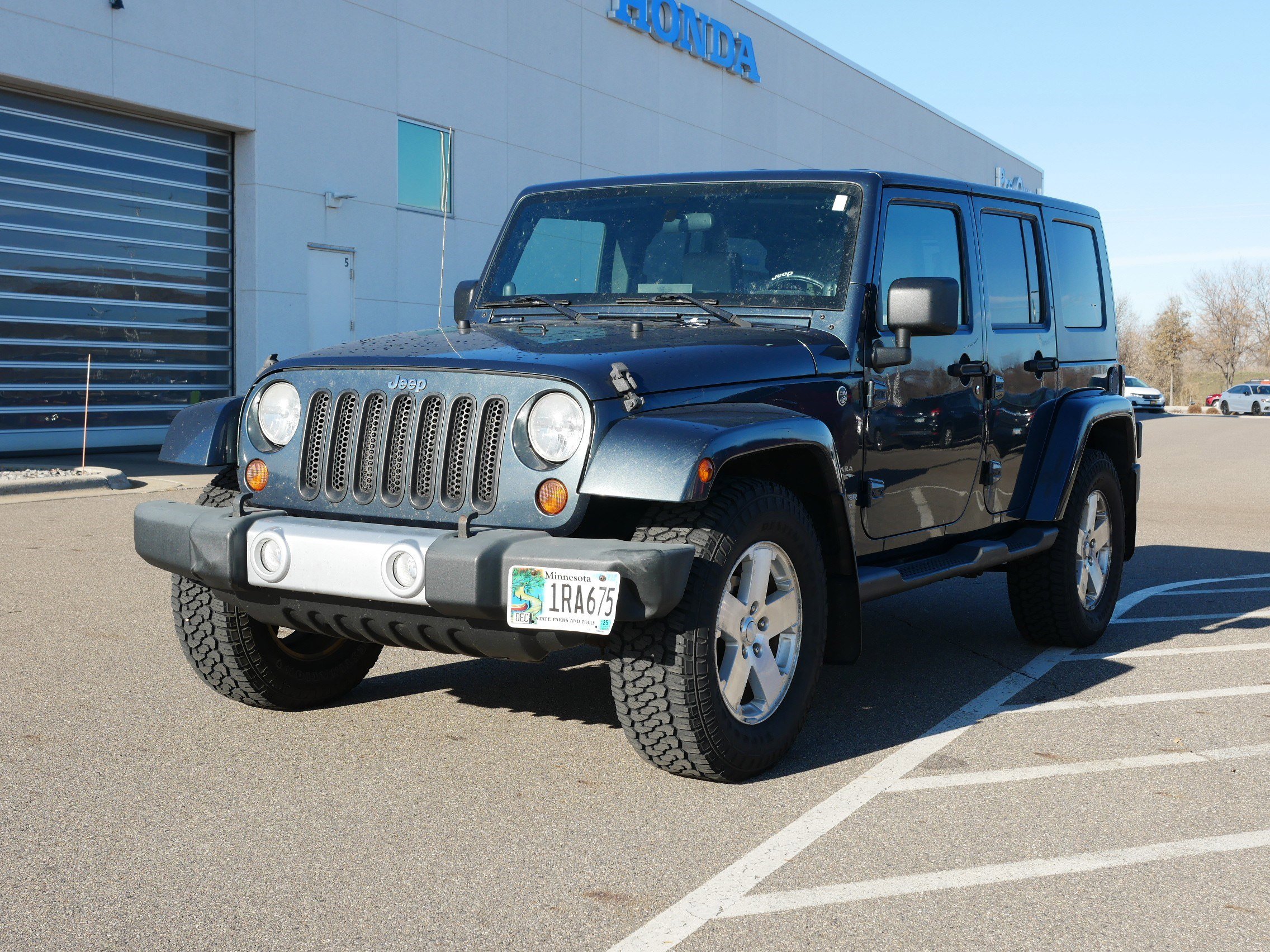 Used 2008 Jeep Wrangler Unlimited Sahara with VIN 1J8GA59138L571909 for sale in Waite Park, MN