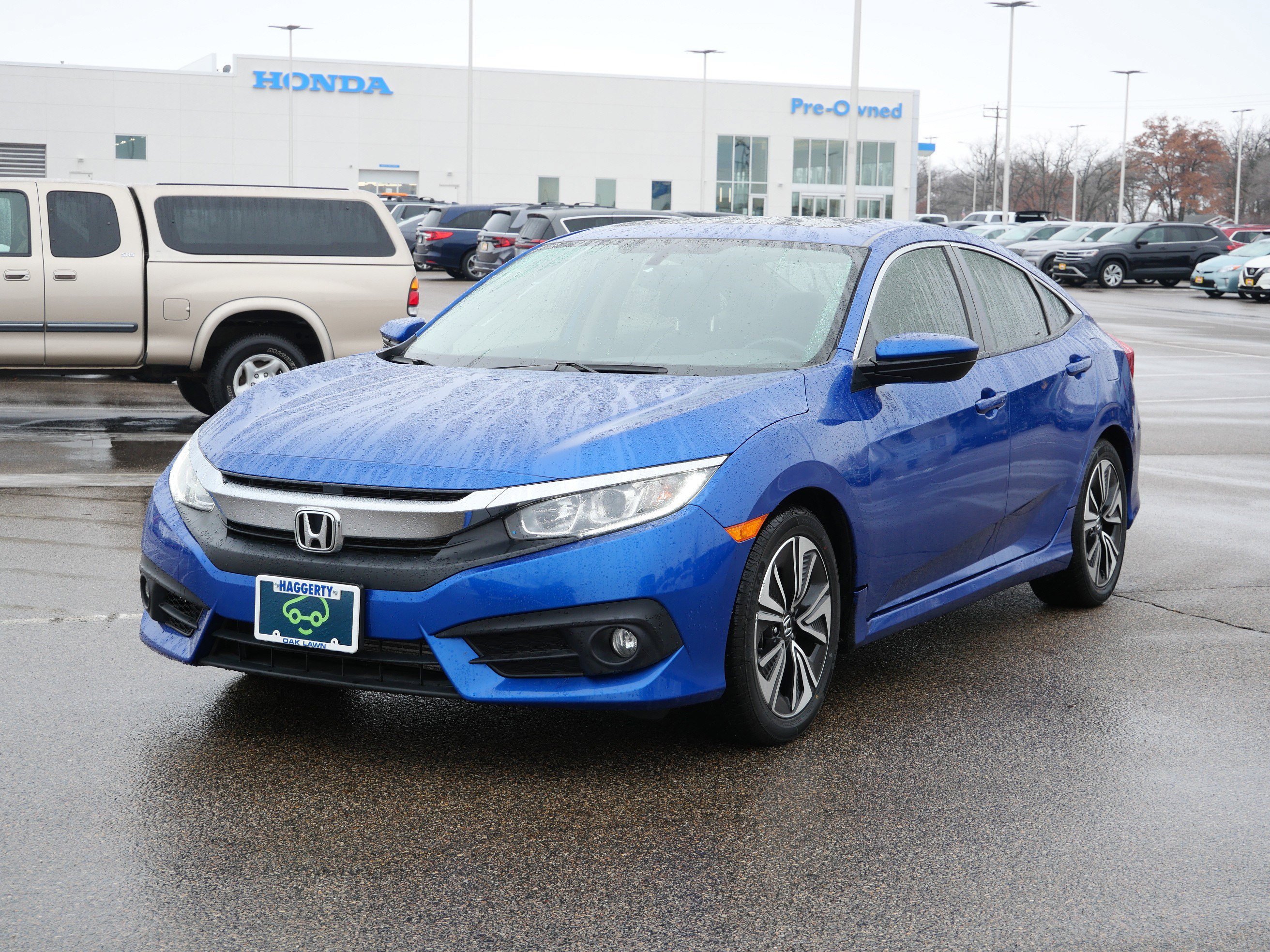 Used 2018 Honda Civic EX-L with VIN JHMFC1F75JX013796 for sale in Waite Park, Minnesota