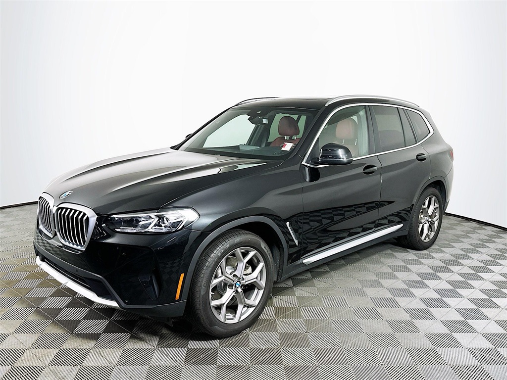 Used 2022 Black Sapphire Metallic BMW xDrive30i image 1