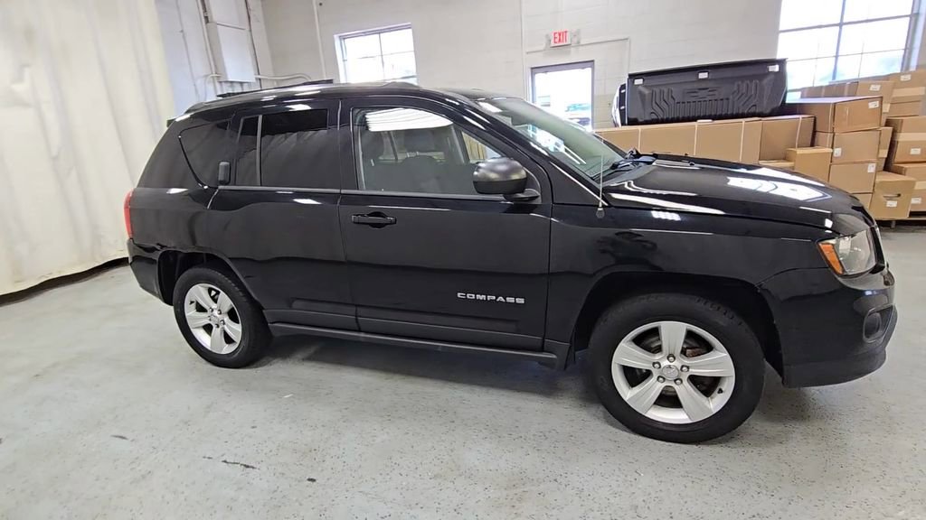 Used 2014 Jeep Compass Sport with VIN 1C4NJDBBXED880150 for sale in Royal Oak, MI