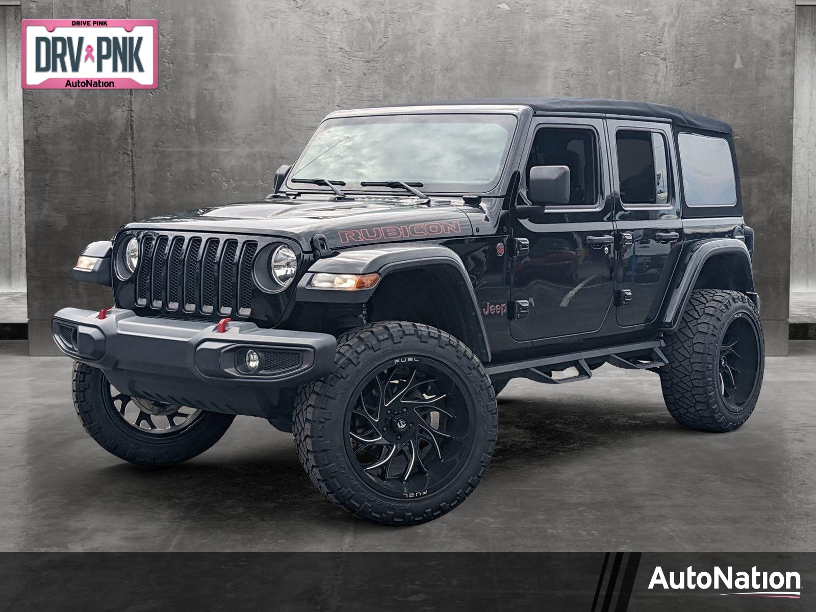 Black Jeep Wrangler With Pink Rims