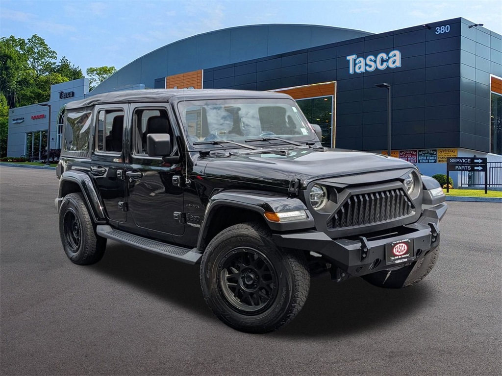 Used 2018 Black Jeep Unlimited Sahara image 1